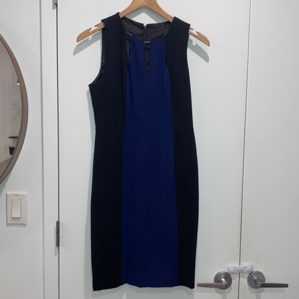 Tahari black and navy blue dress with cutout neck details.